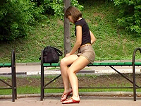You will have to make an effort to try to understand if this sweetie sitting on the bench wears panty up skirt or no.